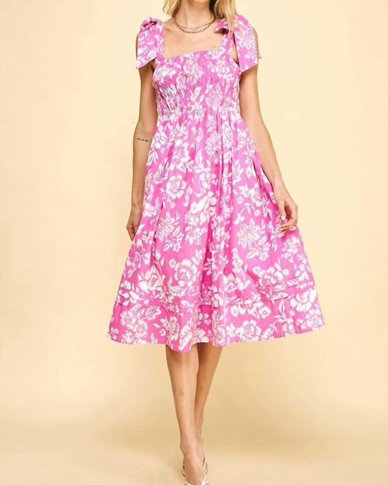 Front of a model wearing a size Large Pink Paradise Midi Dress in Pink in Pink by PINCH. | dia_product_style_image_id:336003